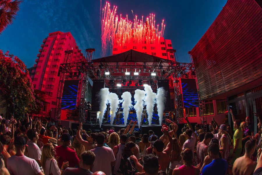 People Dancing Near Stage at Night